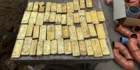 Construction workers find gold bars, coins buried in a cellar wall