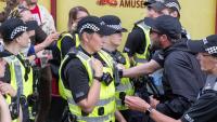 Masked anti-immigration protesters clash with anti-racism activists in Falkirk