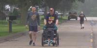 Lisbon man completes 5K with sons’ help nearly two years after stage 4 lung cancer diagnosis
