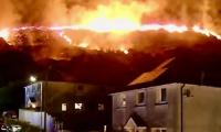 'Appalling' wildfire rages near people's homes in Wales as 200 soldiers are deployed to help firefighters