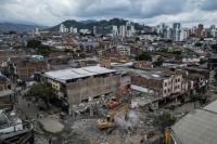 World AFP Hope fades for finding survivors of Colombia quake as rescued woman dies