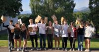 Students celebrate exam results but top grades below national average