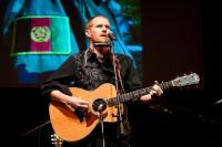 Smith’s songs tell a sobering history of service