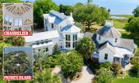 Florida's $12 million private island goes on sale for the first time in 150 years - complete with a secret library and glass 'rainstorm' chandelier