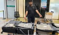 Two foreigners plead guilty in China to trafficking 70 kg of cannabis despite 'in transit' claim