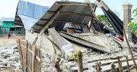 Thousands evacuated after Indonesia quake killed 51, cut roads