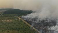 Two dead, hundreds evacuated from fires near Athens