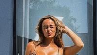 Love Island's Millie Court turns heads in tiny leopard-print bikini on Marbella holiday