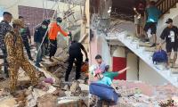 Indonesian rescuers rush to save earthquake victims trapped in the rubble after 7.7-magnitude tremor collapses buildings - as death toll rises to 51 and thousands evacuated