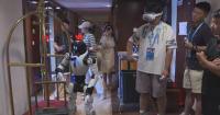 Humanoid robots test hospitality skills at 2nd World Humanoid Robot Games in Beijing