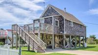 Outer Banks Beach Cottage That Has Been ‘Lifted Out of Flood Zone’ Is Listed for Under $350K