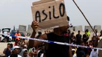 Moroccan migrants stage sit-in as thousands remain stranded in Ceuta