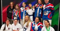 Martial arts students bring home 14 medals from international karate competition