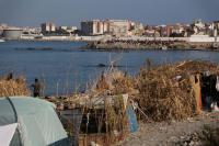 In Spain’s Ceuta, hundreds of migrants stage protest and demand asylum