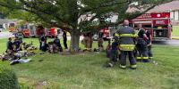 Firefighter taken to hospital after house fire in Douglass Hills neighborhood
