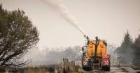 Firefighters battle massive fires in Belgium and Greece