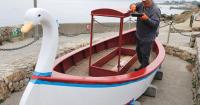 Margruss, the Lovers Point swan boat, gets its first makeover in years thanks to volunteers.