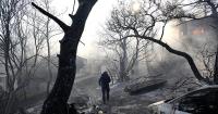 Firefighters battle massive wildfires in Belgium and Greece as 2 die on an island near Athens