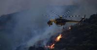 Military Helicopters and Tractors Aid in Battling Belgium's Largest Forest Fire