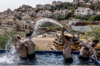 Zionist settlers divert Palestinian water to fill West Bank pool