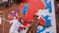 Chinatown artist paints Philly icons in mural featuring LeBron James