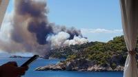 Greek island holiday hotspot battling wildfires that have 'taken over entire mountain'