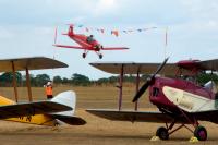 Plane crashes at sold-out UK air show with pilot rushed to hospital