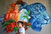 World AFP Winning back walls from gangs, artists fill El Salvador's towns with color