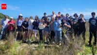 In 1997, a New Zealand teacher began planting a windswept coastal paddock with Year 9 students; 29 years later, 12,425 plants have turned it into native habitat
