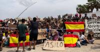 Hundreds of migrants in Ceuta protest for asylum