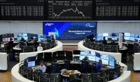 European shares tick higher as easing Fed hike bets lift gold