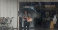 Lala again a tropical storm, sending rain and winds across the Hawaiian islands