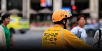 China Tests Pausing Countdowns for Delivery Riders at Red Lights