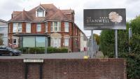Somalian small boat migrant ‘slashed worker multiple times with kitchen knife at asylum hotel near Heathrow’