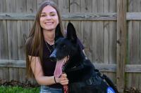 Army veteran reunites with retired bomb-sniffing dog she served beside in Iraq