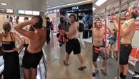 Hong Kong: Shirtless Tourists Do Pull-Ups, Swing From Handrails Inside MTR Train, Video Goes Viral (WATCH)