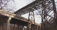 Rusty condition of train bridge that travels over Parkway West draws concern