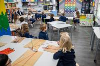 Students enjoy classroom furniture made for kids’ needs