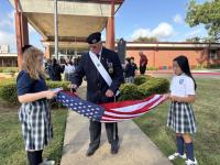 Knights of Columbus visit James L. Collins Catholic School, donate U.S. and Texas flags