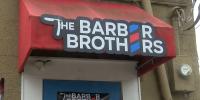 ‘It’s a huge help’: Northeast Ohio barber shop gives free back-to-school haircuts, supplies to kids