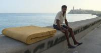 Cubans seek refuge on rooftops, in parks, and along the malecón to sleep during power outages in Havana