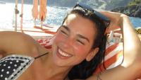 Dua Lipa sizzles in tiny bikini amid girls' trip to Italy