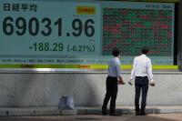 Asia shares decline as worries about rising oil prices outweigh perks from strong earnings