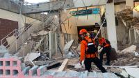 Deadly Indonesian earthquake exposes unsafe housing and rescue cuts