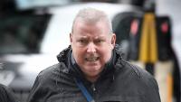 'Weird' maths teacher who touched girl pupils hair and sang 'I love you' banned from schools