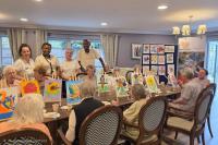 Art Expressions UK CIC delivers joyful sip and paint wellbeing session at Squires Mews Care Home, Northampton