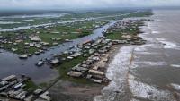 African town vanishes as Atlantic swallows coast