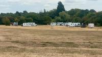 Travellers head onto field close to ASDA superstore