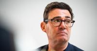 U.K. Prime Minister Andy Burnham says he’s not embarrassed about messaging someone impersonating a top Trump aide