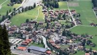 Looming rock collapse threatens Swiss village as thawing permafrost destabilizes the Alps